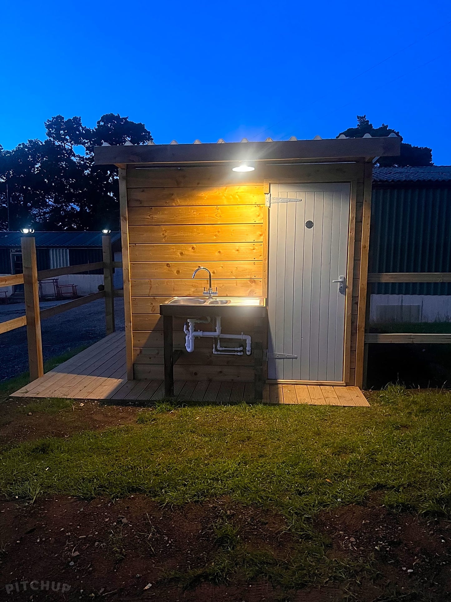 Electric optional grass and gravel touring pitch