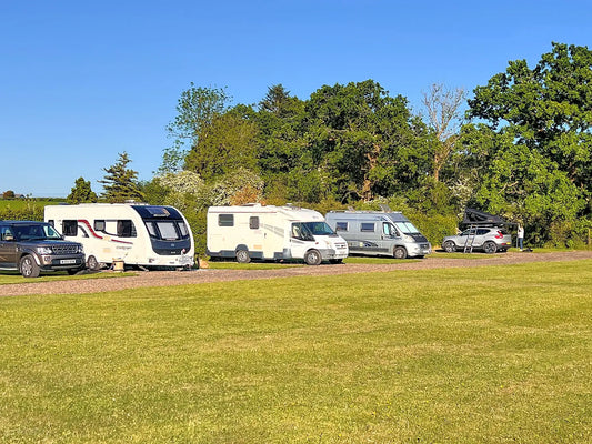 Electric optional grass and gravel touring pitch